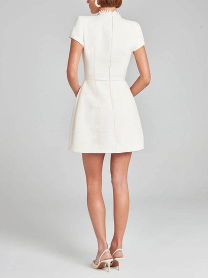 Exquisite and Playful Pearl Trim Pocket Mini Dress